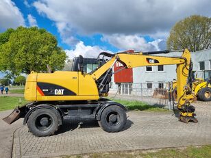 ratinis ekskavatorius Caterpillar M313D Engcon